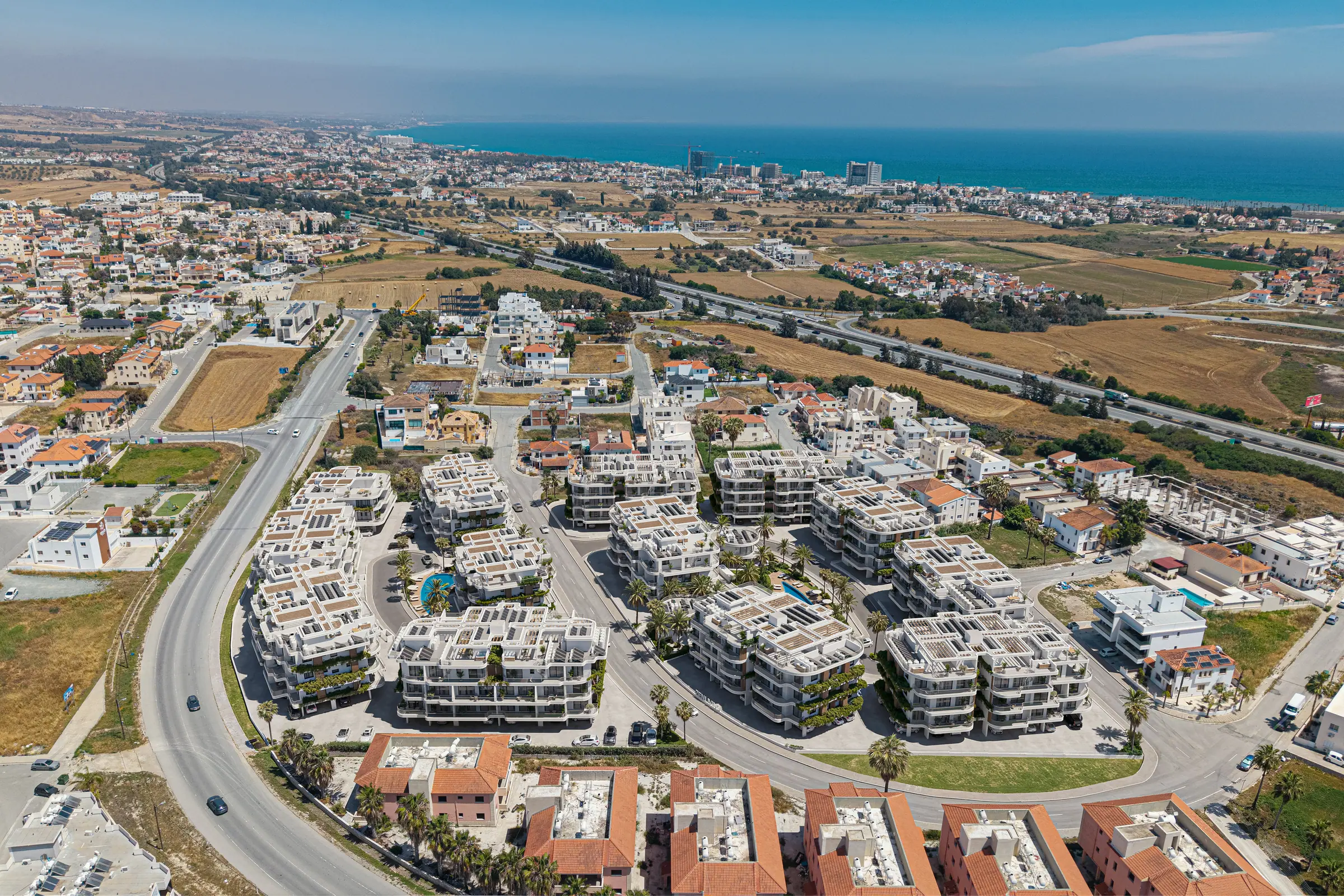 Aerial view of Zin Residences set between Oroklini and the Larnaca coastline